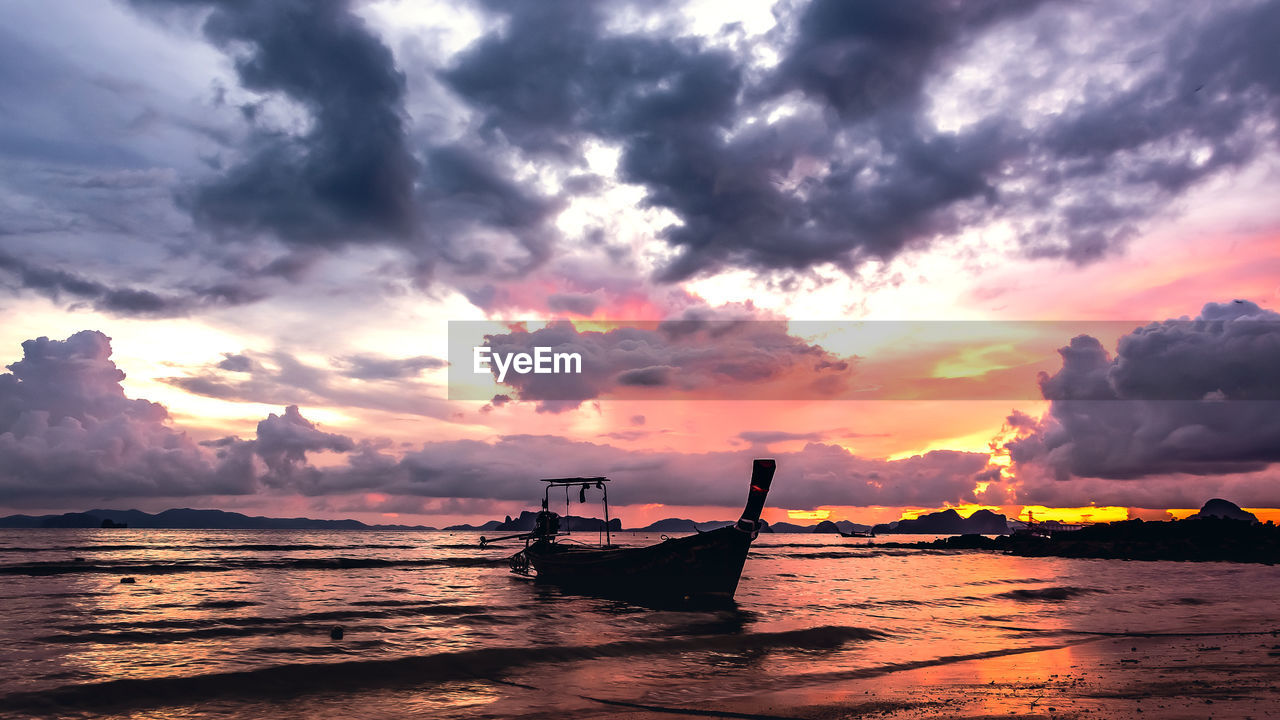 SCENIC VIEW OF SEA DURING SUNSET