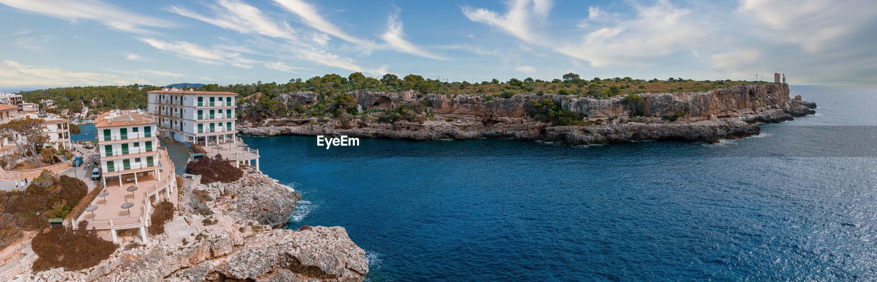 Aerial view of the porto colom fishing village in majorca.