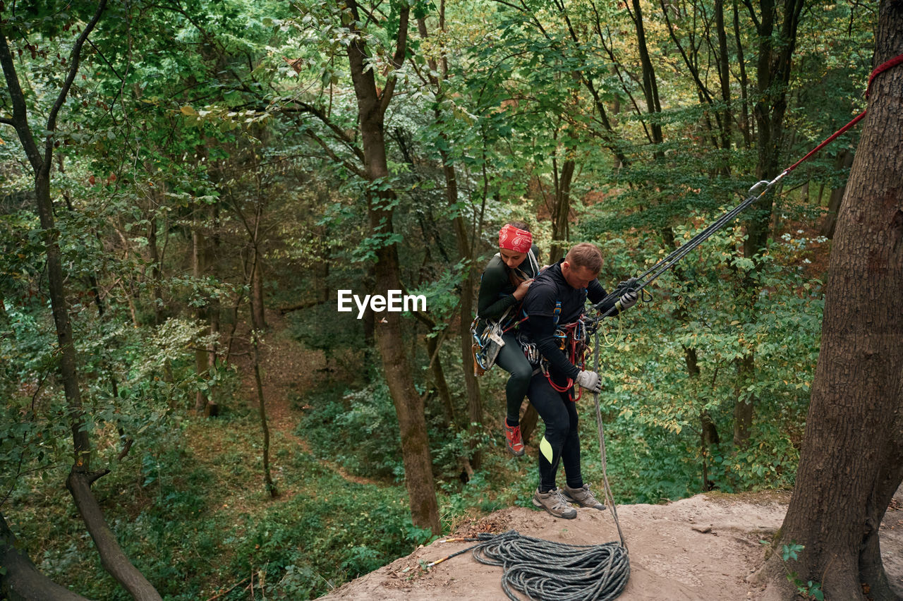 rear view of man walking on road