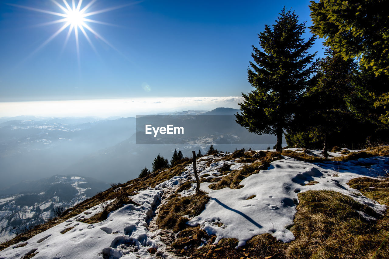 View of the snow-capped alps from cima marana near recoaro vicenza italy