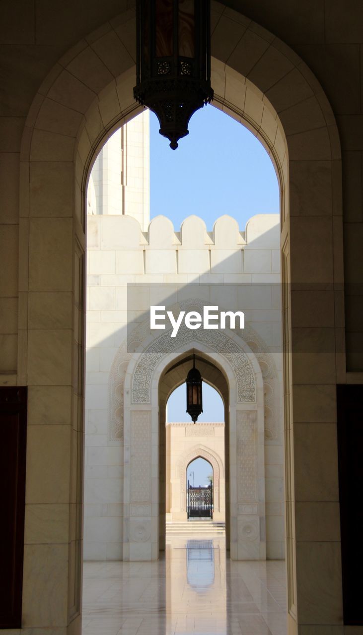 BUILDING SEEN THROUGH ARCH