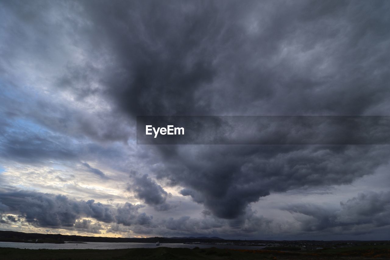 DRAMATIC SKY OVER LANDSCAPE