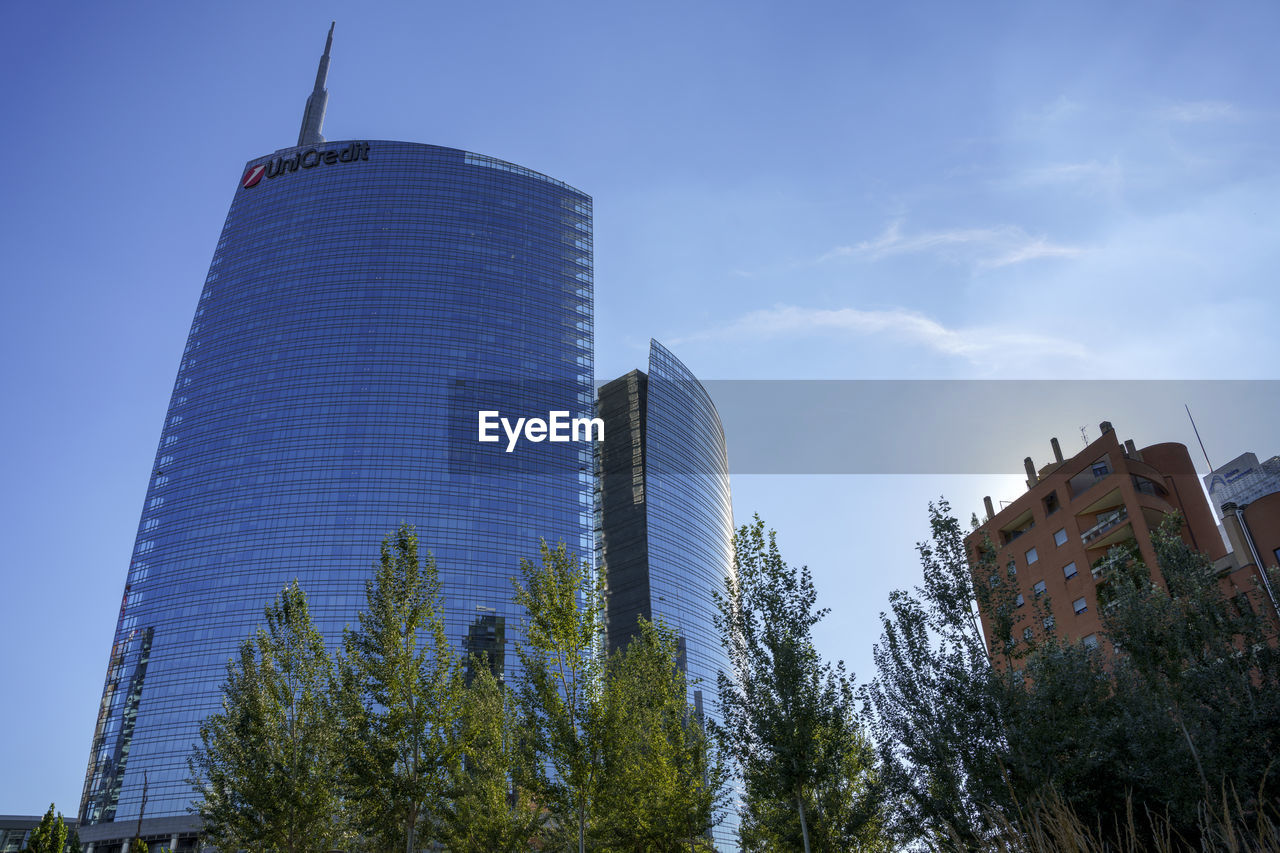 LOW ANGLE VIEW OF MODERN BUILDINGS