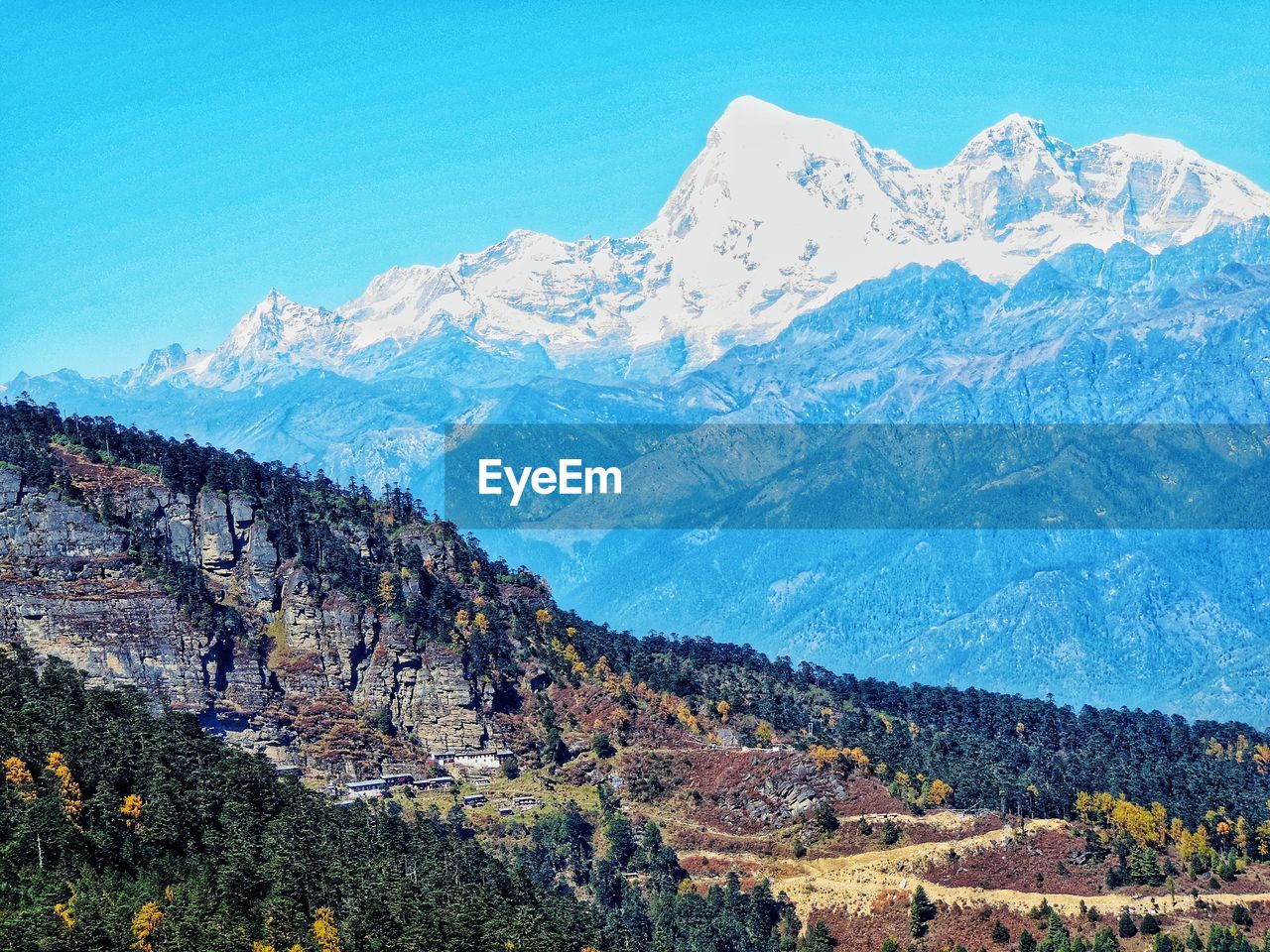 SCENIC VIEW OF MOUNTAINS AGAINST SKY DURING WINTER