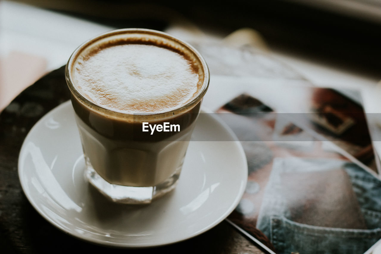 Close-up of coffee cup in saucer