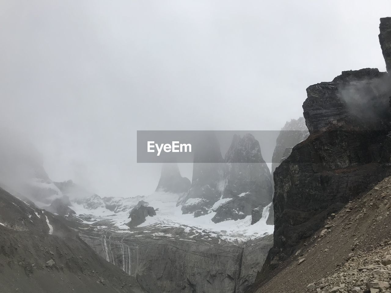 Scenic view of mountains against sky during winter