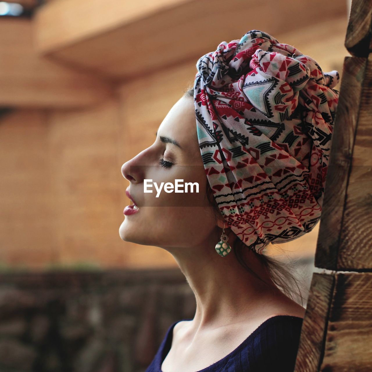 Profile view of beautiful woman wearing headscarf