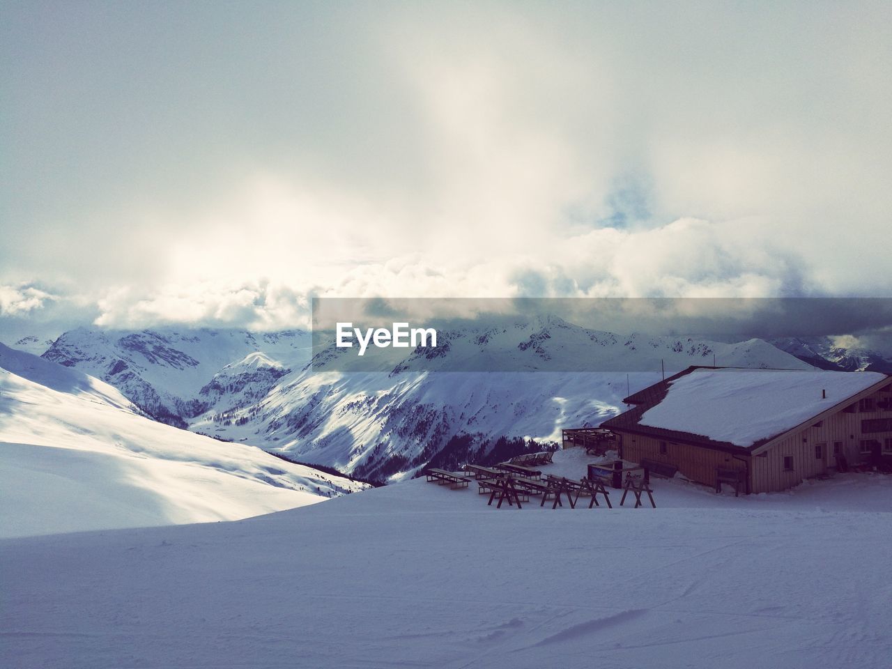 Morning view of snow covered mountains against sky