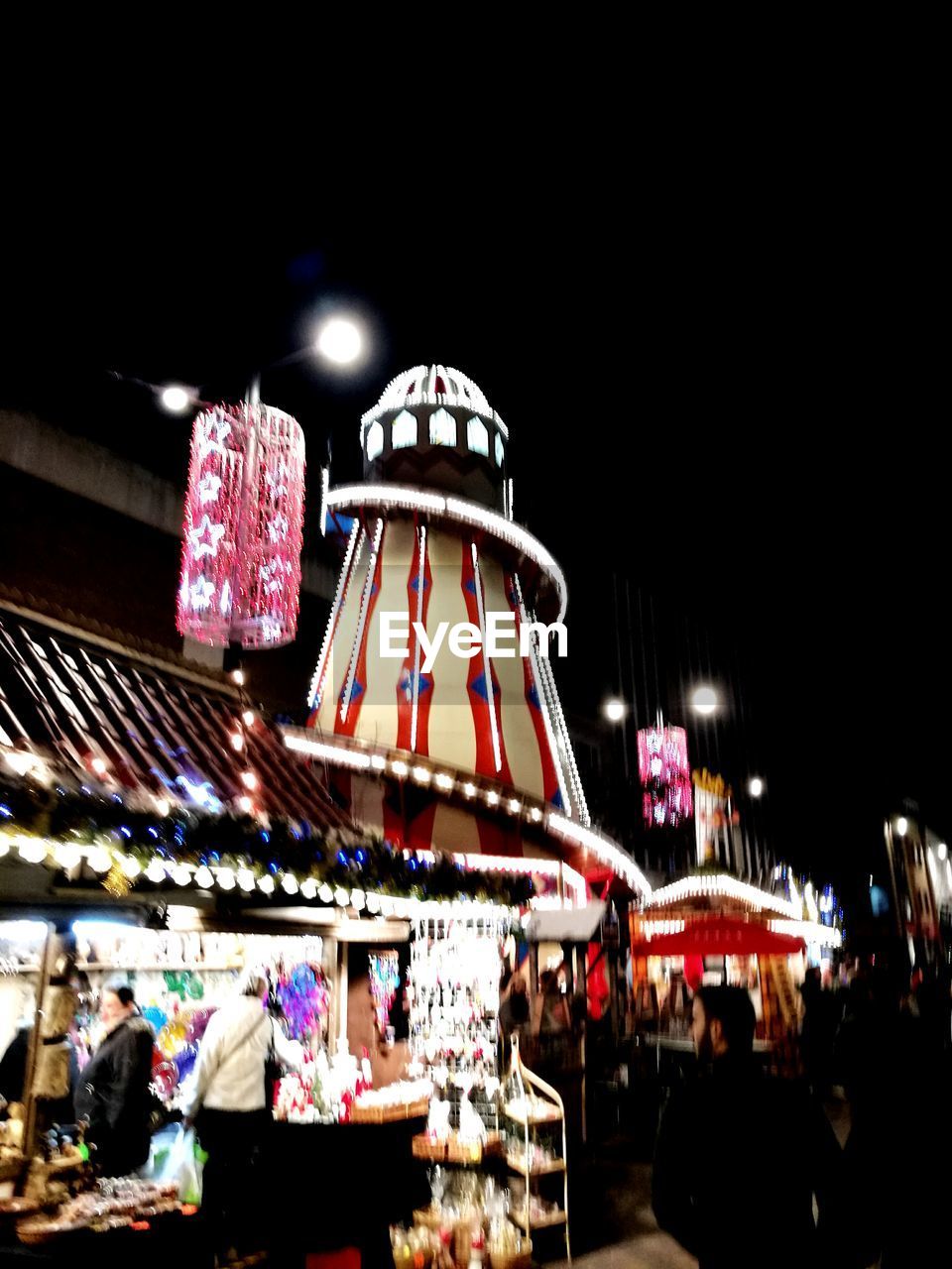 CROWD AT NIGHT IN CITY