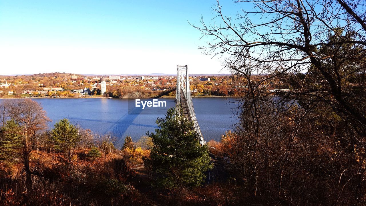 View of bridge over river in city