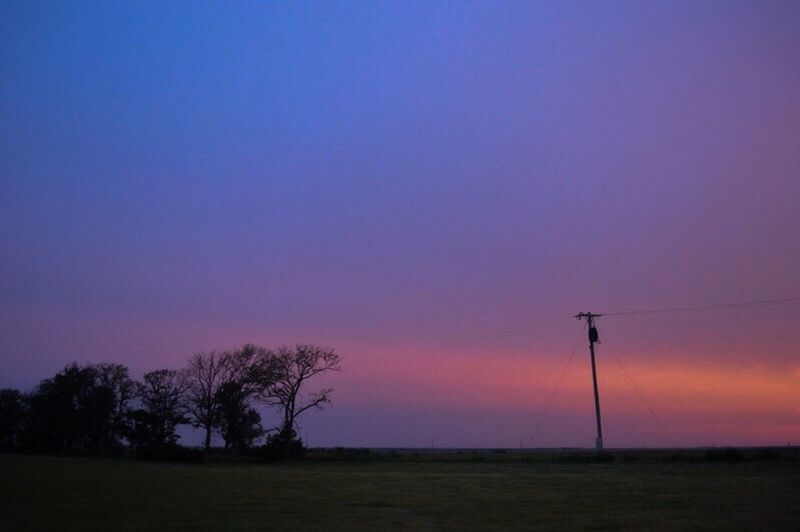 SUNSET OVER FIELD