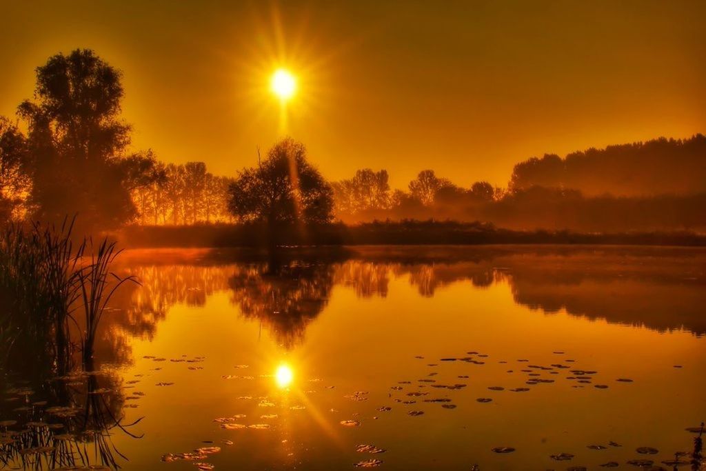 SUNSET OVER LAKE