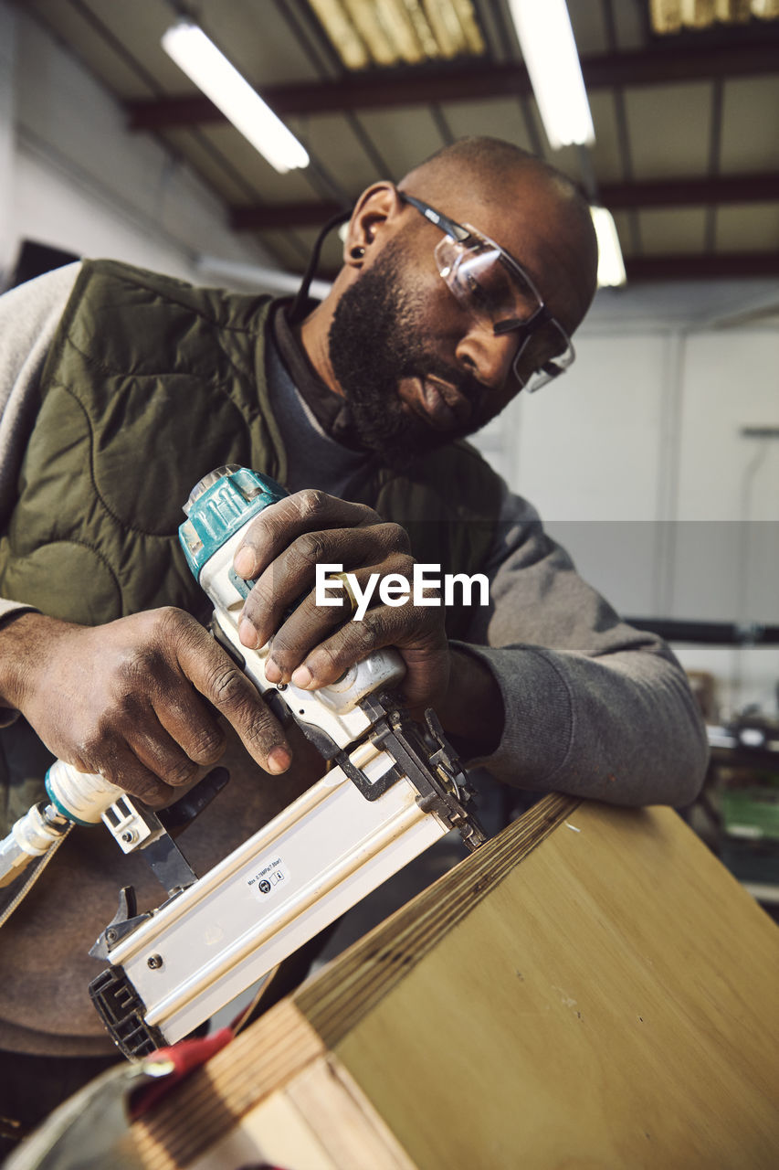 Carpenter working at workshop