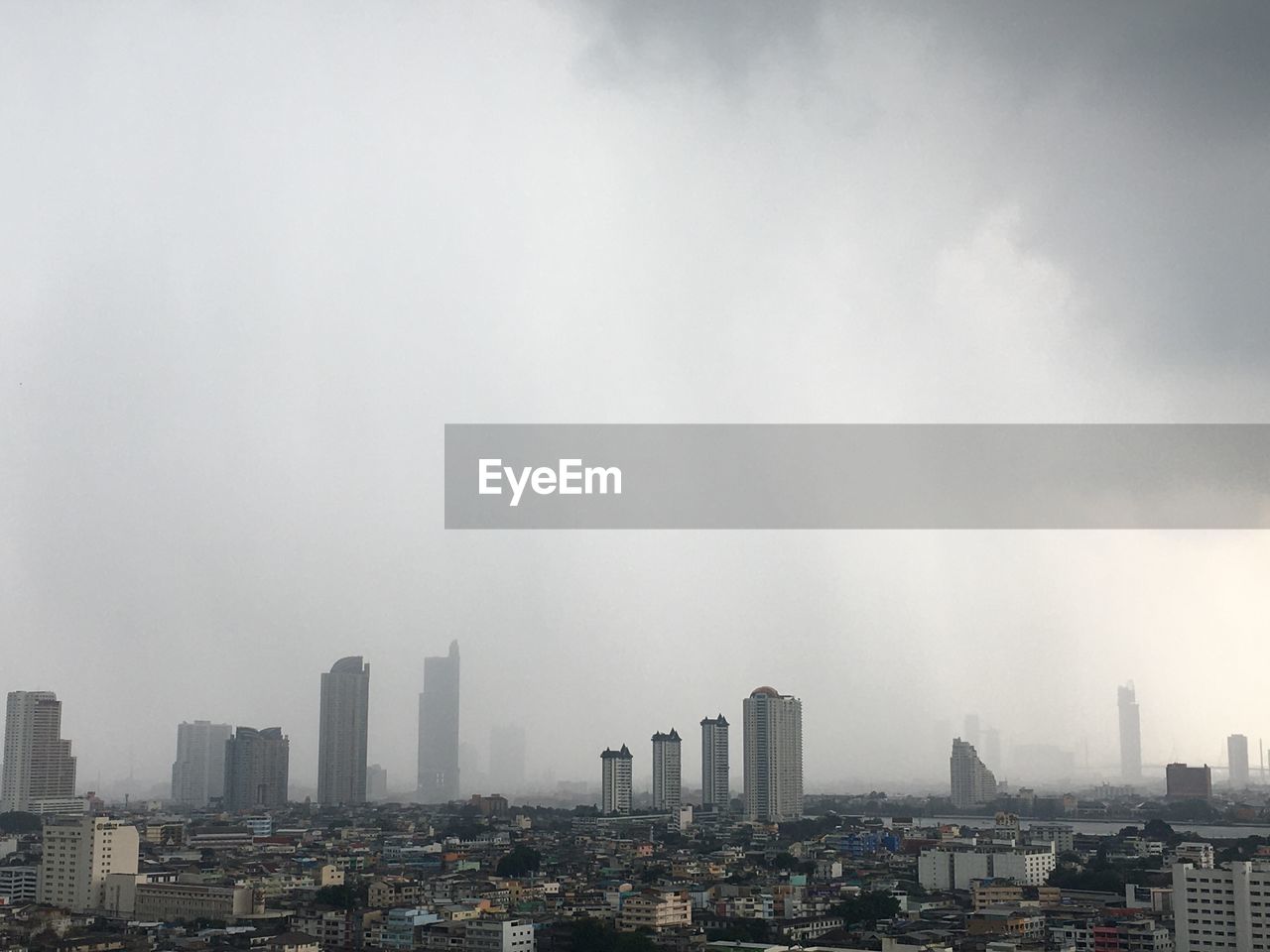 Modern buildings in city against sky