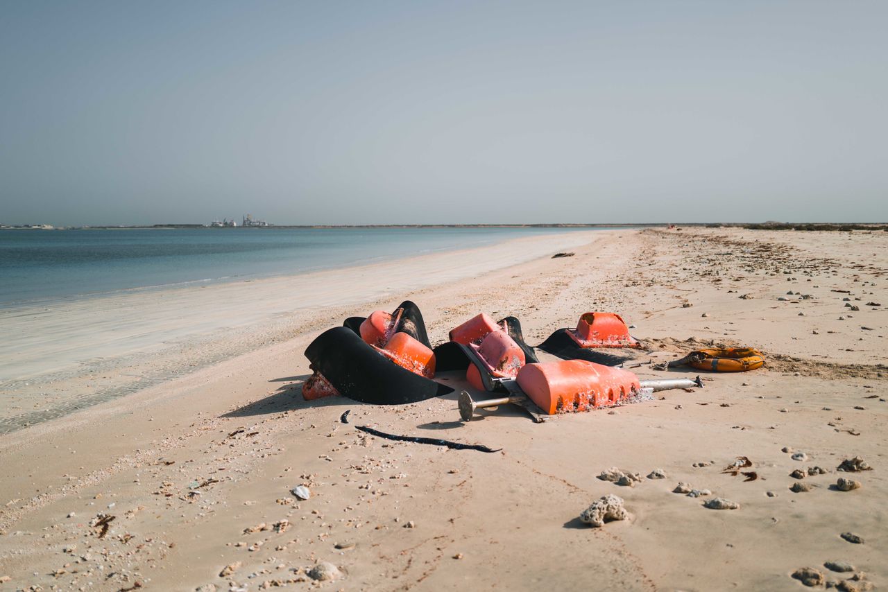 Plastic waste on the secluded beach in dubai