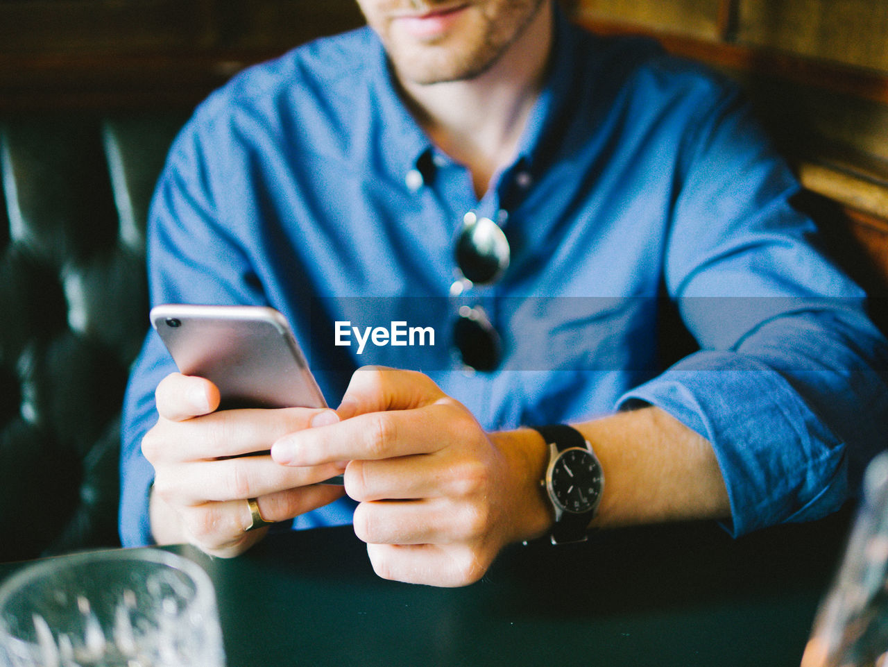 Close-up of man using mobile phone