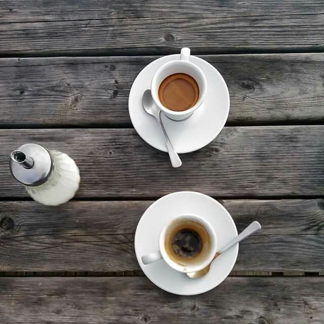 High angle view of coffee on wooden table
