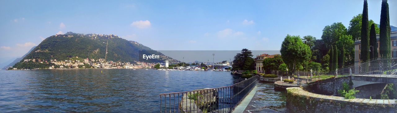 Panoramic view of bay against sky