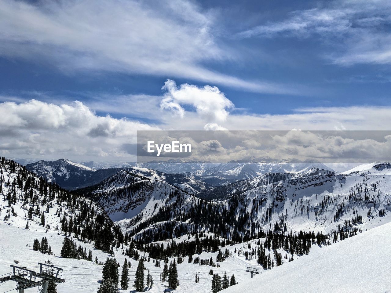 SNOW COVERED MOUNTAIN AGAINST SKY