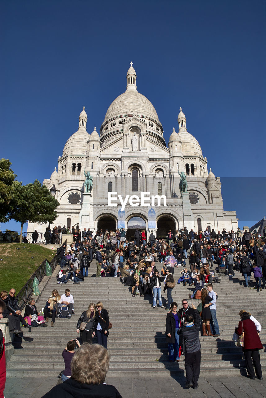 Tourists at sacre coeur basilica