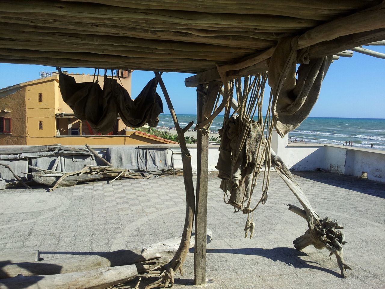 Wooden hut against sea