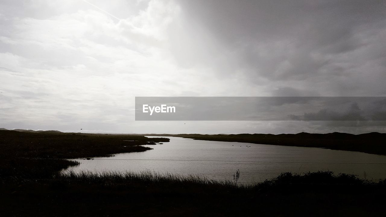 VIEW OF RIVER AGAINST SKY