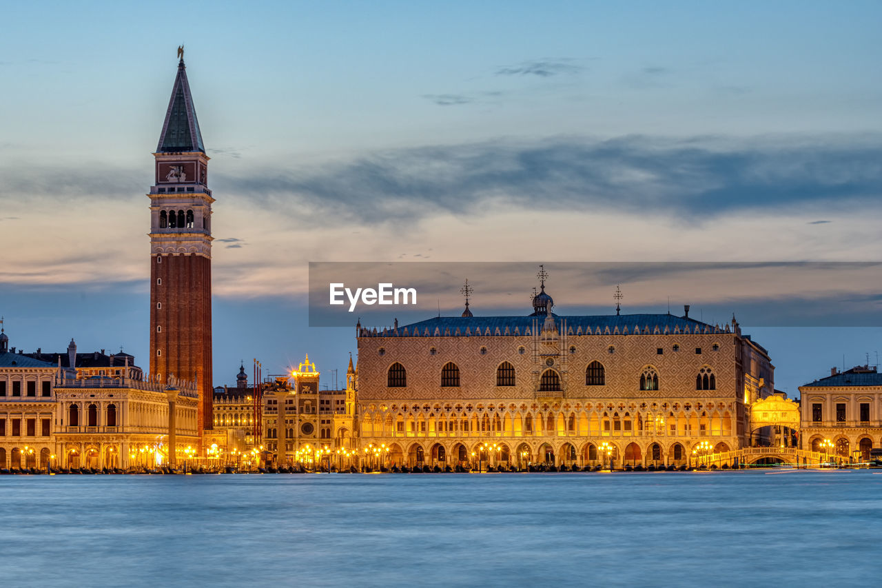 View to piazza san marco in venice after sunset with the famous campanile and the doge's palace