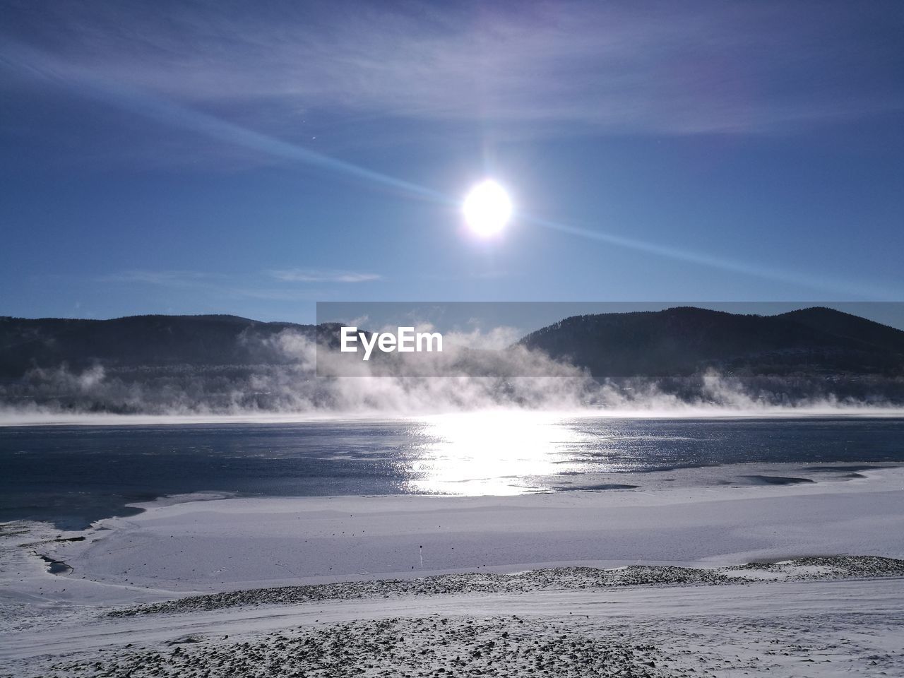 Scenic view of beach against sky