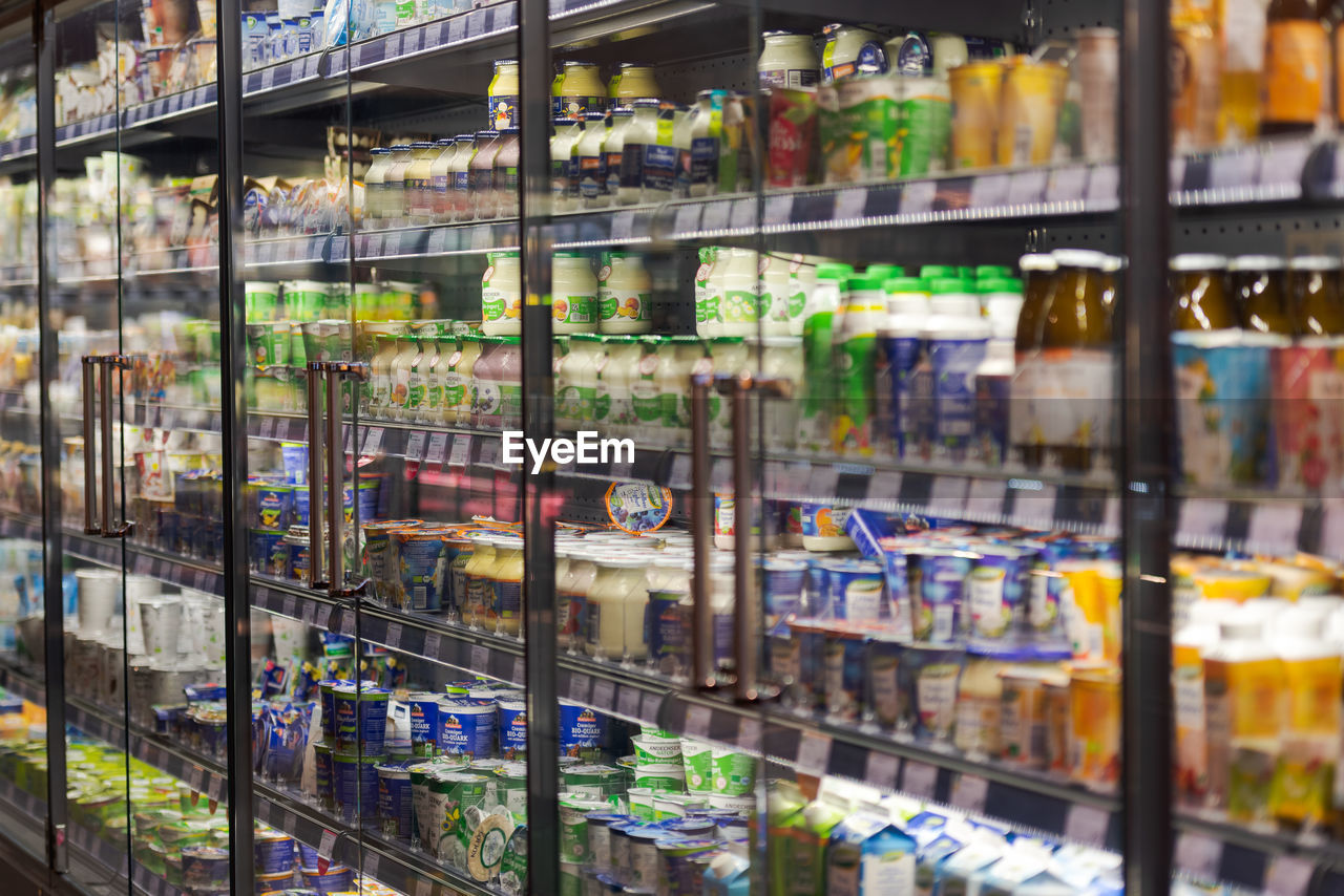 FULL FRAME SHOT OF GLASS BOTTLES