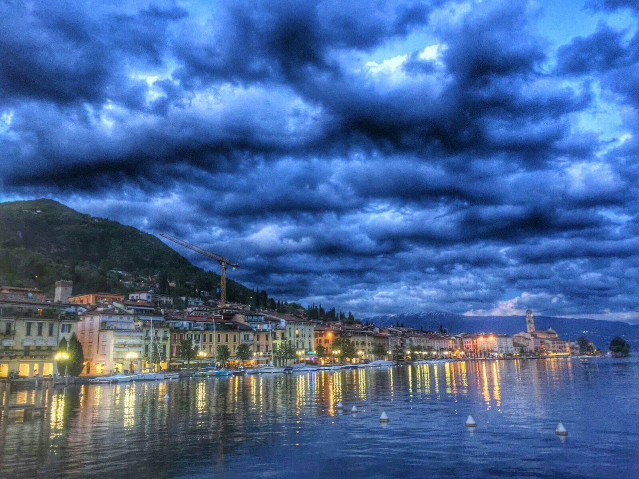 VIEW OF RIVER AGAINST CLOUDY SKY