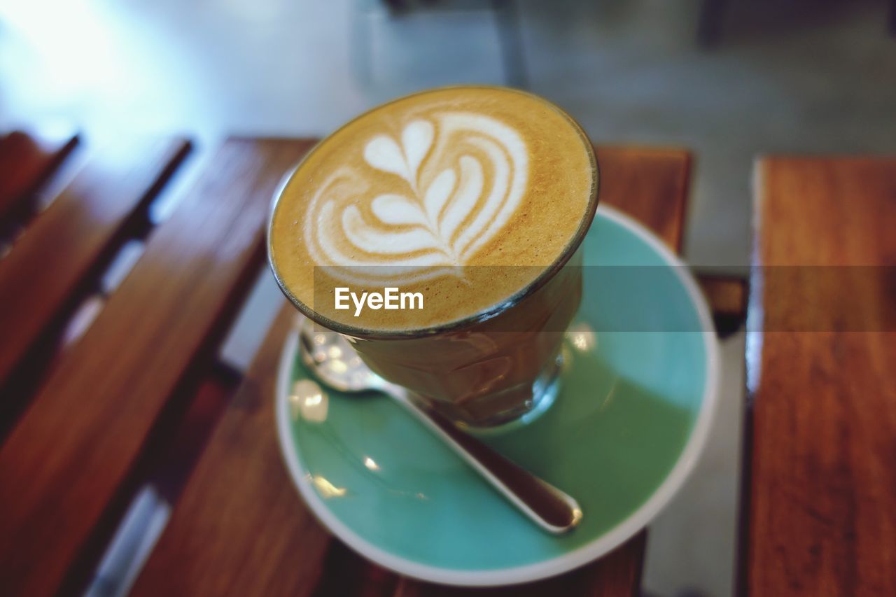 Close-up of cappuccino on table