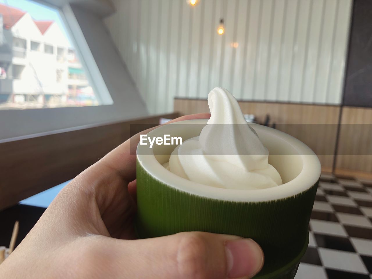 MIDSECTION OF PERSON HOLDING ICE CREAM IN PLATE