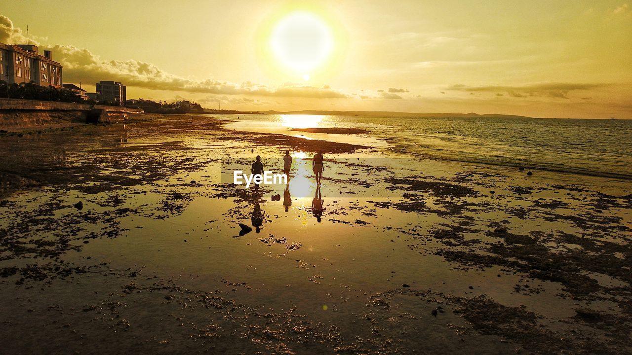 Scenic view of sea against sky at sunset