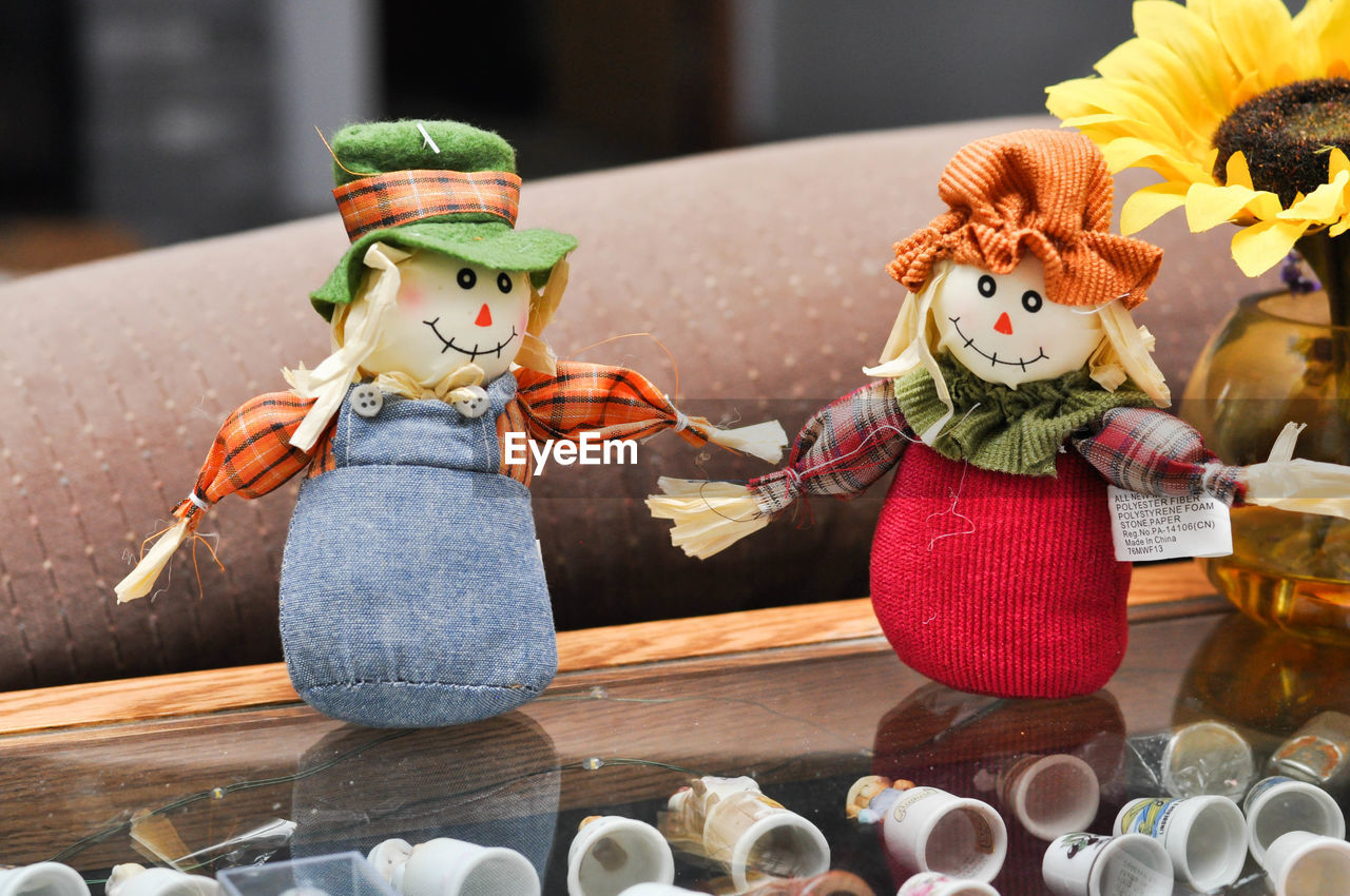 CLOSE-UP OF STATUES ON TABLE AT CHRISTMAS