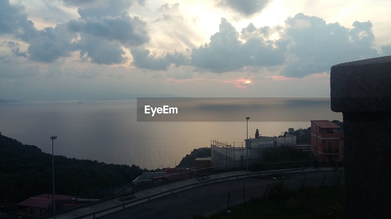 PANORAMIC VIEW OF SEA AND CITY AGAINST SKY