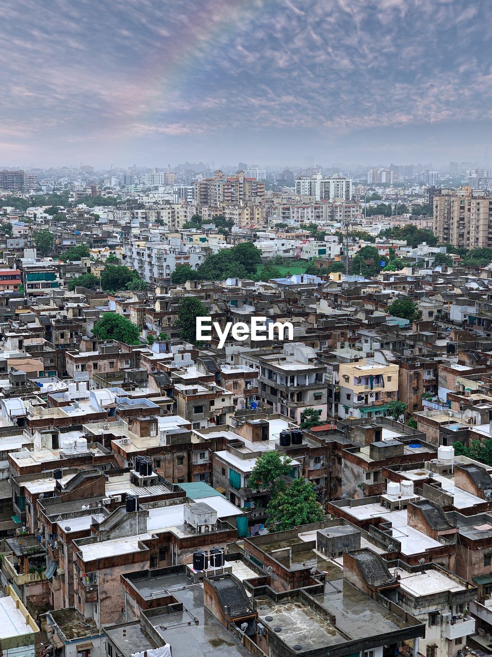 High angle view of buildings in city against sky