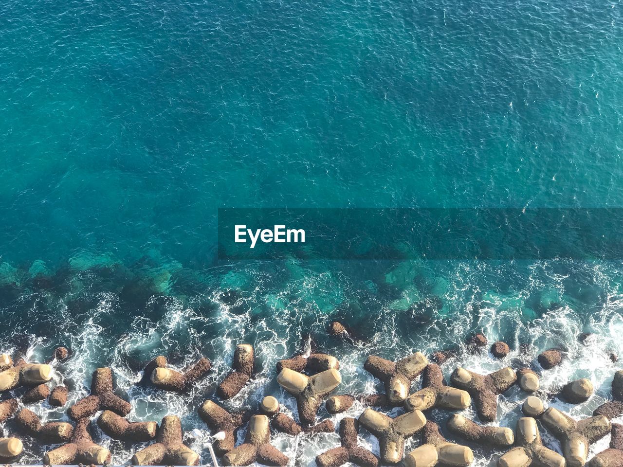 Scenic view of sea against blue sky