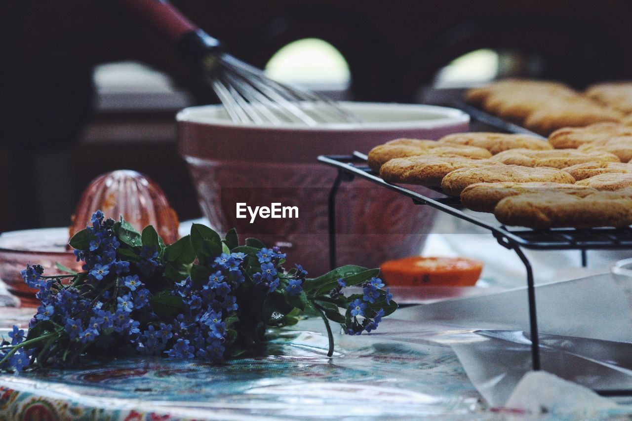 Close-up of cookies with flower on table