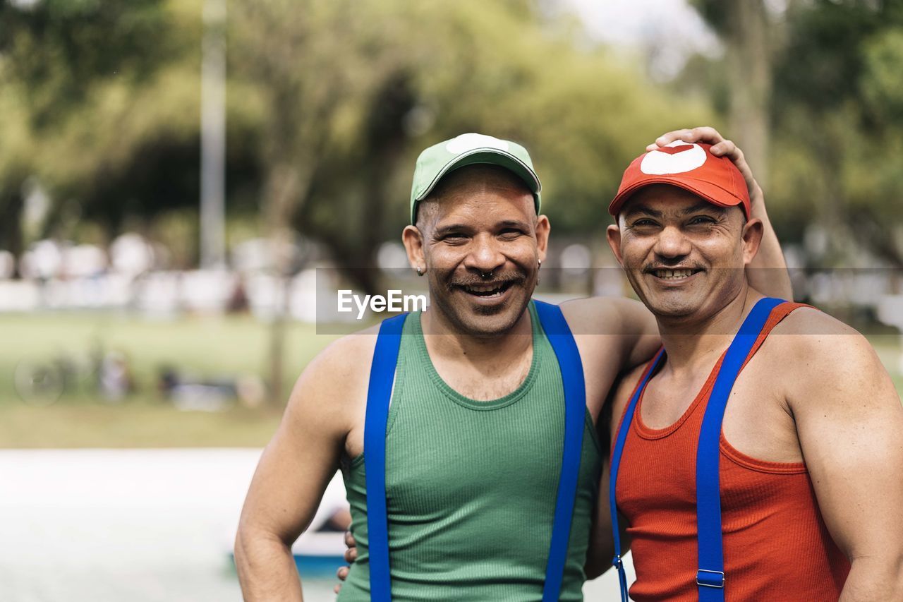 Portrait of smiling young boys standing on the day of latino gay pride in south america.