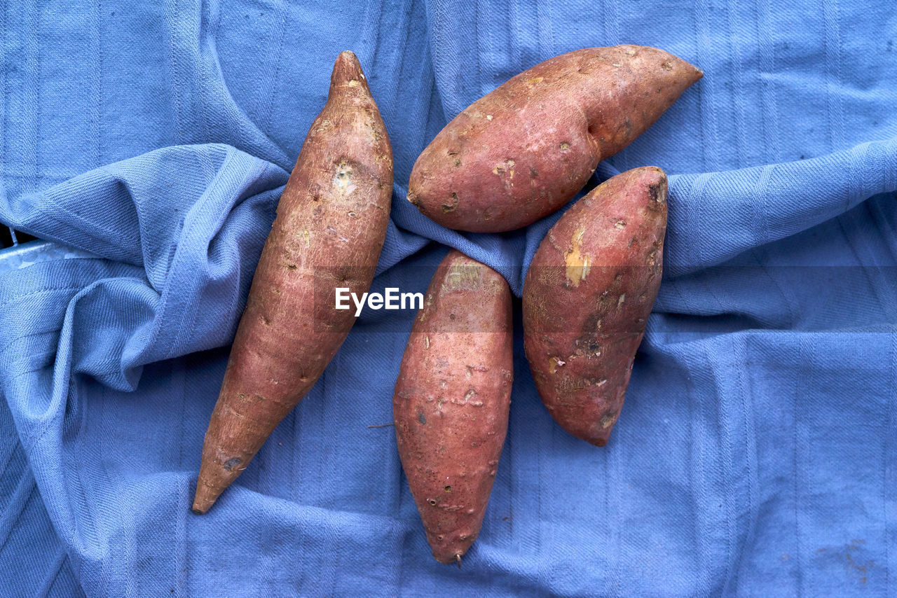 High angle view of sweet potatoes on table