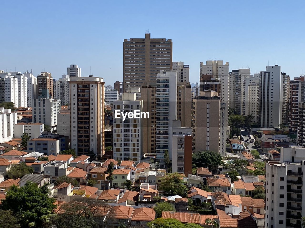 BUILDINGS IN CITY AGAINST SKY