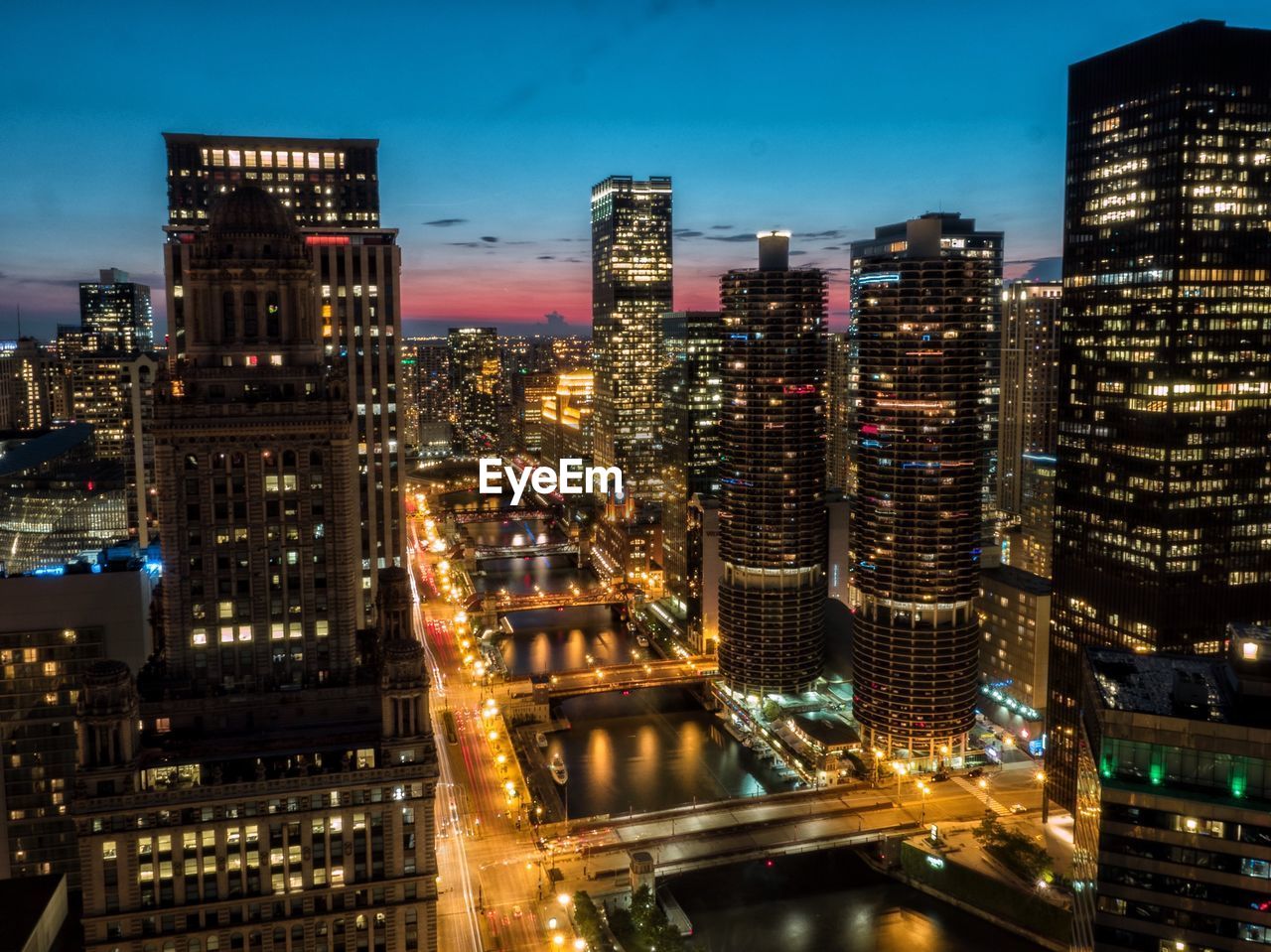 High angle view of illuminated city at night