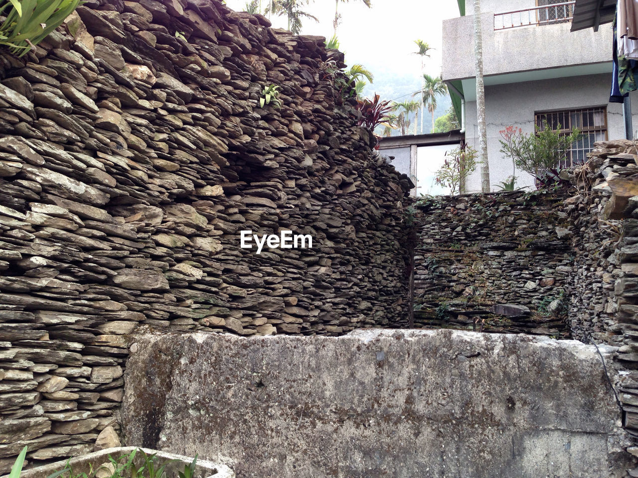 LOW ANGLE VIEW OF STONE WALL