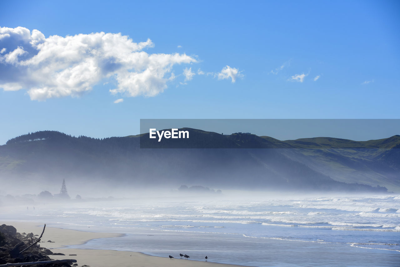 SCENIC VIEW OF SEA AGAINST BLUE SKY