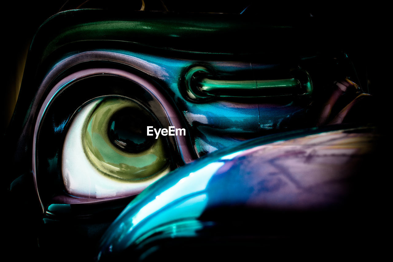 Close-up of evil looking statue eye