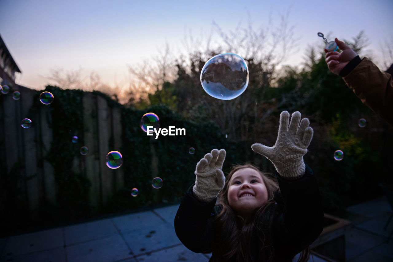 Portrait of girl with bubbles