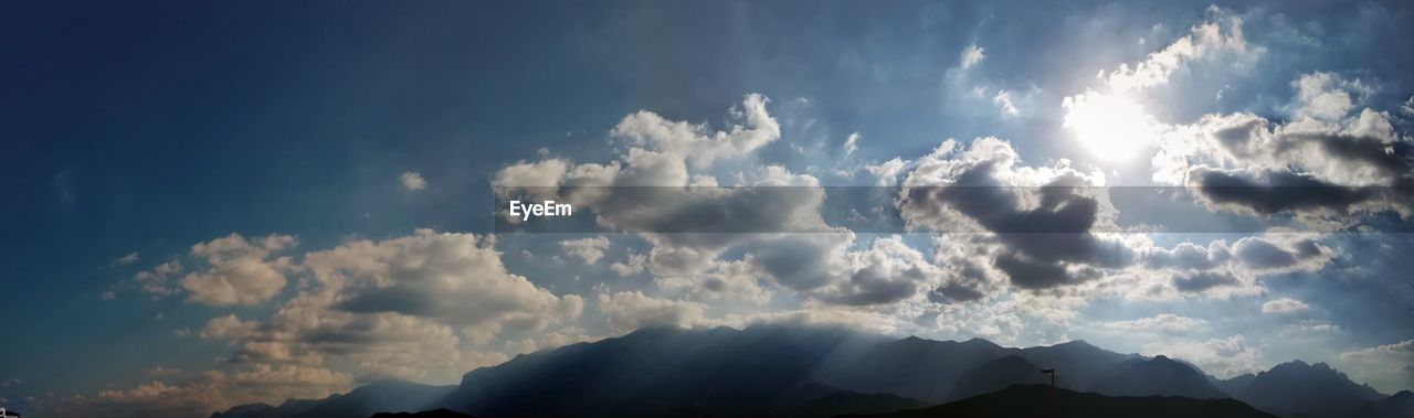 LOW ANGLE VIEW OF CLOUDS AGAINST BLUE SKY