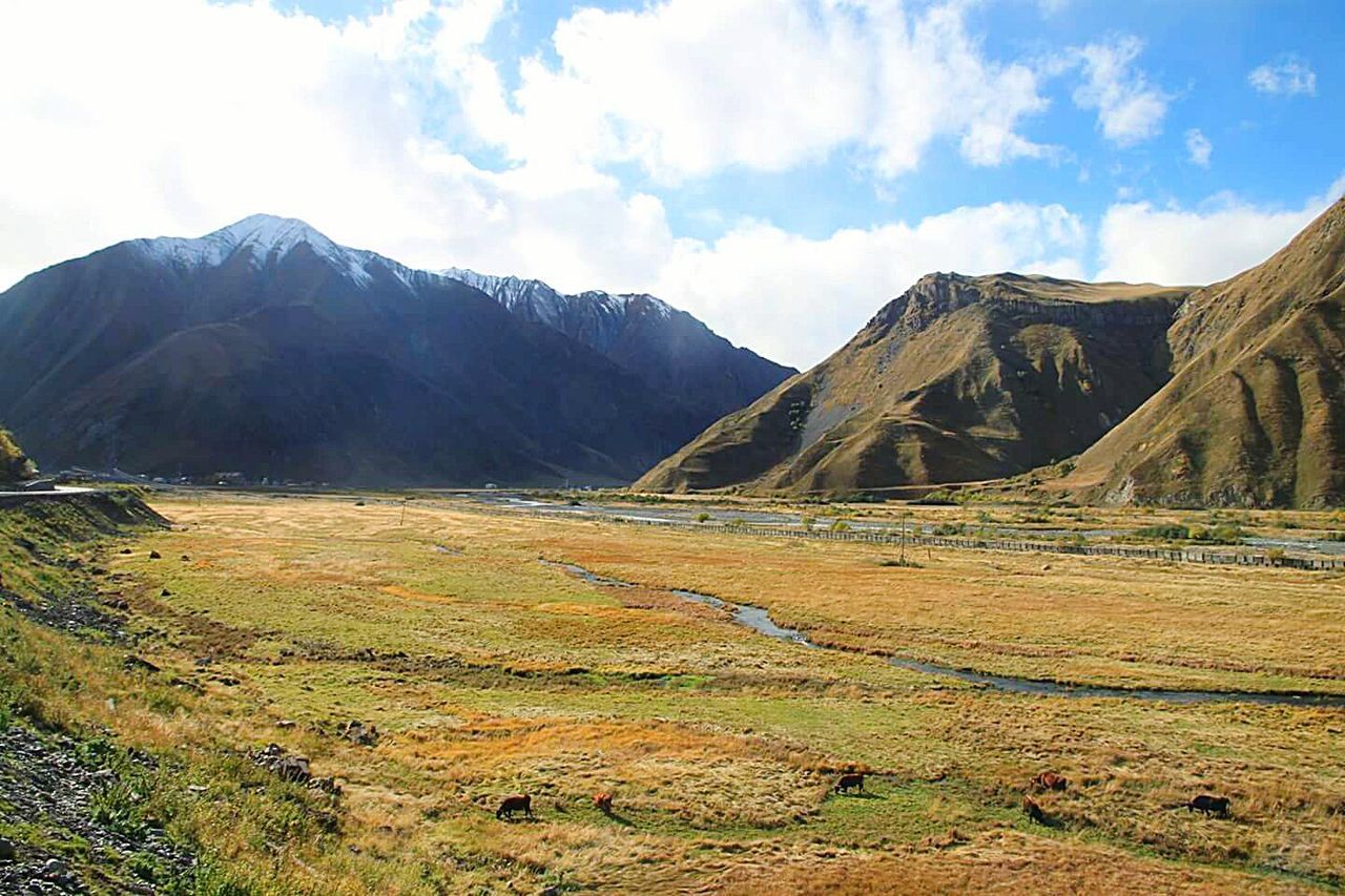 PANORAMIC SHOT OF MOUNTAINS AGAINST SKY