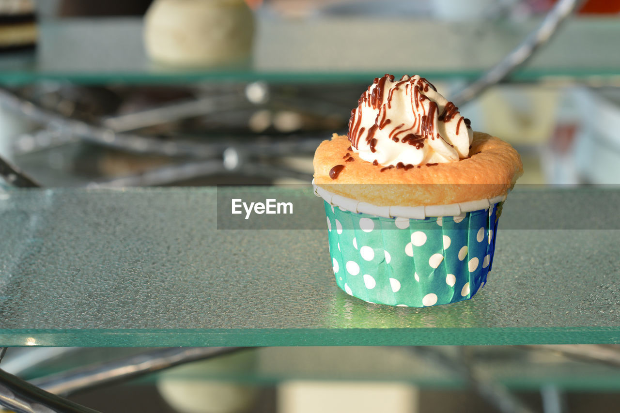 Close-up of cupcakes on table