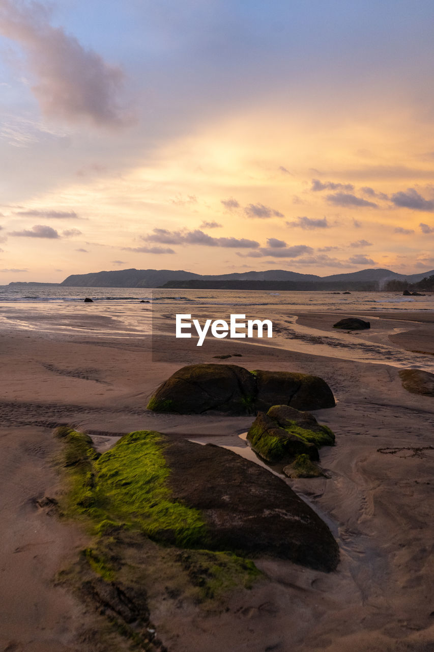 SCENIC VIEW OF SEA DURING SUNSET